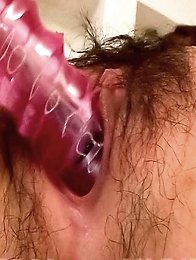 Asuka Asian sucks dildo and fucks her hairy crack with it a lot