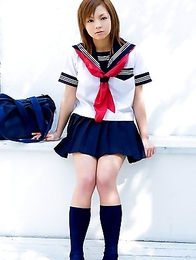 Runa Hamakawa plays with her uniform skirt after classes