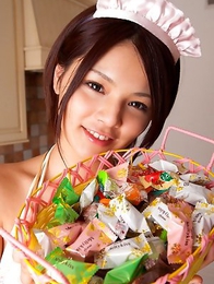Tsubasa Akimoto in kinky lingerie has candies to offer